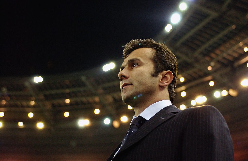 Yugoslavia coach Dejan Savicevic watches play from the sidelines