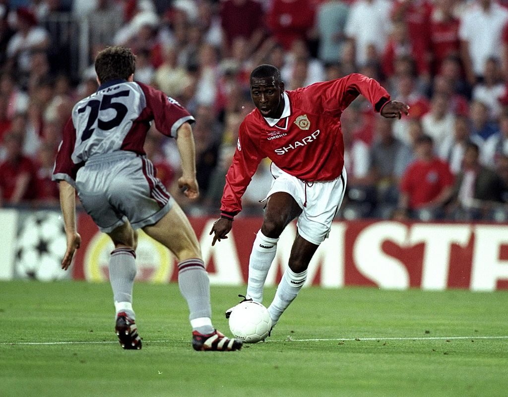 Andy Cole takes on Thomas Linke