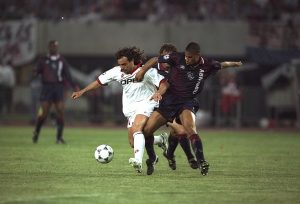 Marco Simone of AC Milan and Winston Bogarde of Ajax