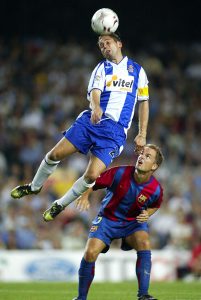 Raul Tamudo of Espanyol and Frank De Boer of Barcelona