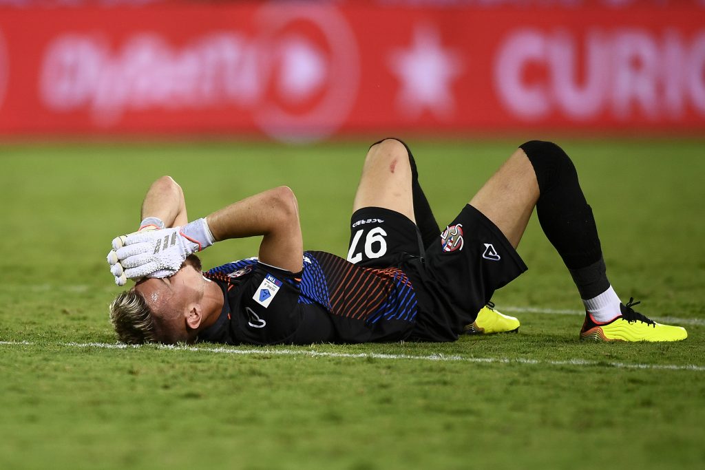 Ionut Radu of US Cremonese looks dejected at the end of the