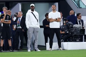 Paul Pogba (L) and Leonardo Bonucci  (R) of Juventus Fc look