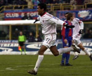 Serginho of AC Milan celebrates scoring