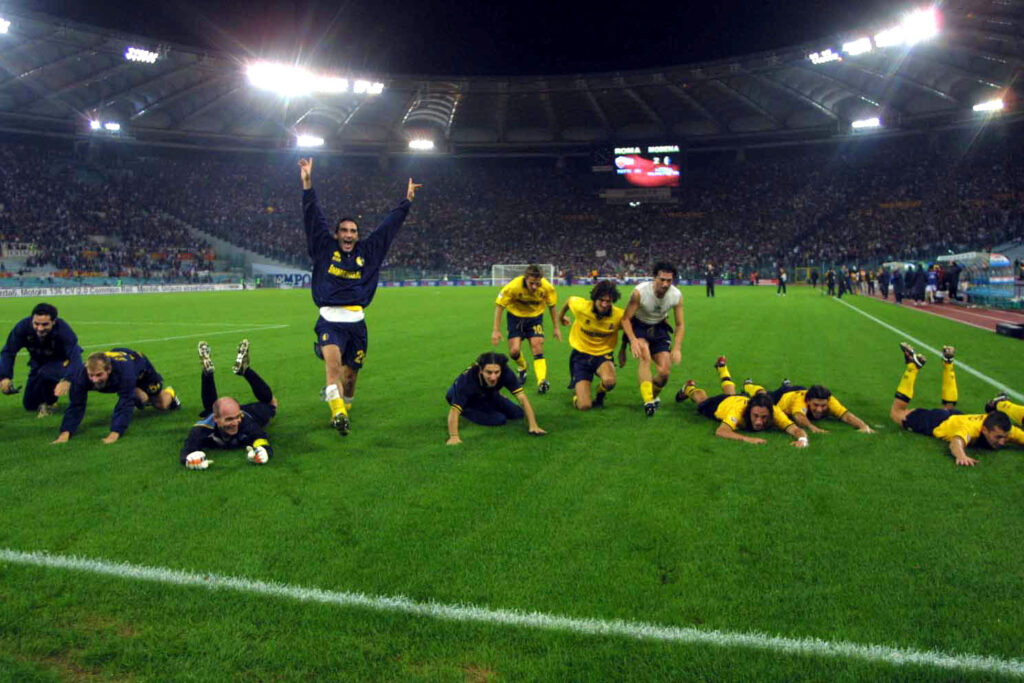 Modena players celebrate their victory over Roma