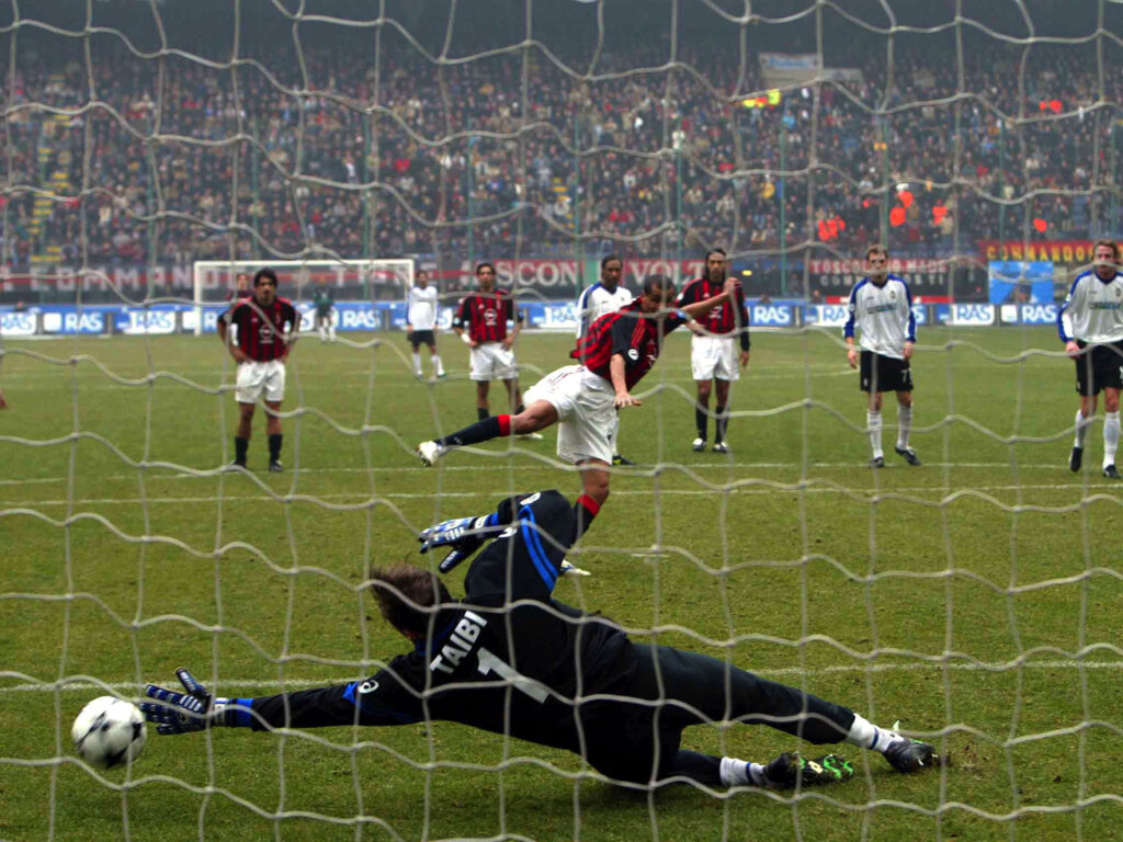 Massimo Taibi of Atalanta saves a penalty from Rivaldo of AC Milan