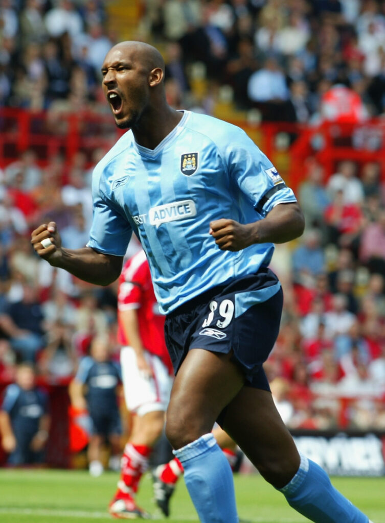Nicolas Anelka of Manchester City celebrates scoring the opening goal