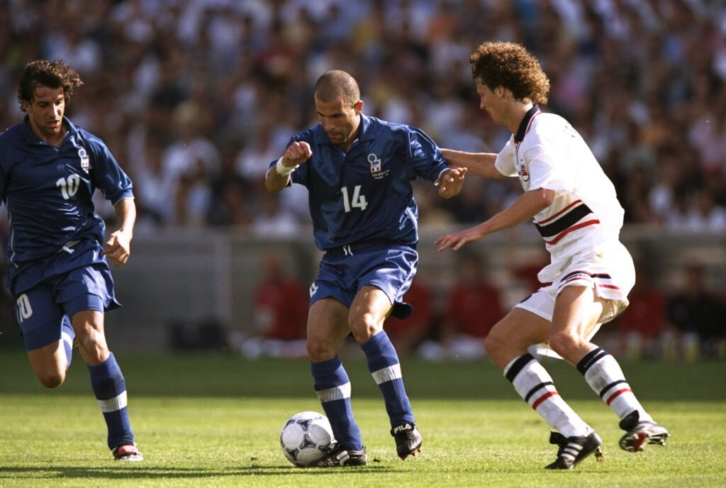 Luigi di Bagio of Italy controls the ball