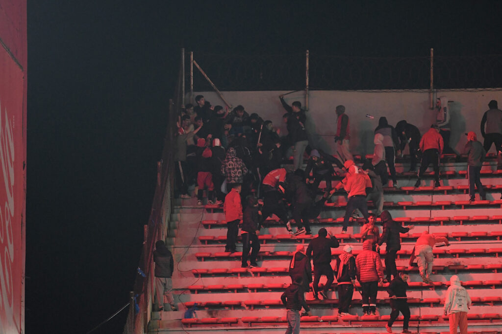 Fans of Independiente And U De Chile Clash During A Copa Sudamericana Game