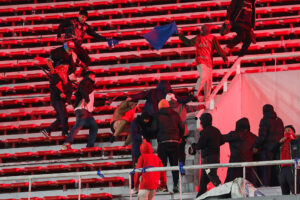 Fans of Independiente And U De Chile Clash During A Copa Sudamericana Game