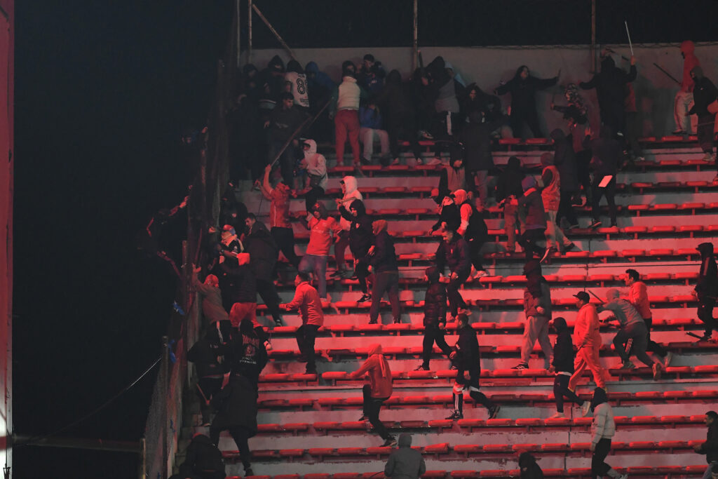 Fans of Independiente And U De Chile Clash During A Copa Sudamericana Game