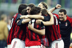 Paolo Maldini of AC Milan celebrates victory with team mates