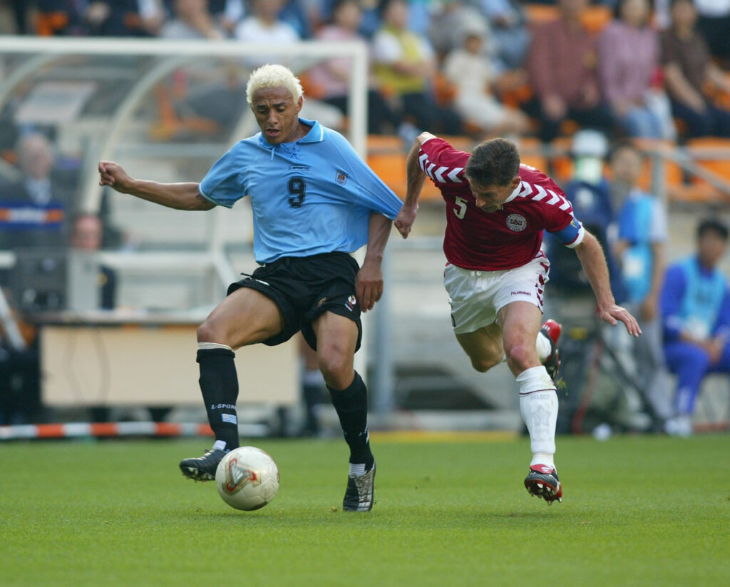 Dario Silva of Uruguay and Jan Heintze of Denmark